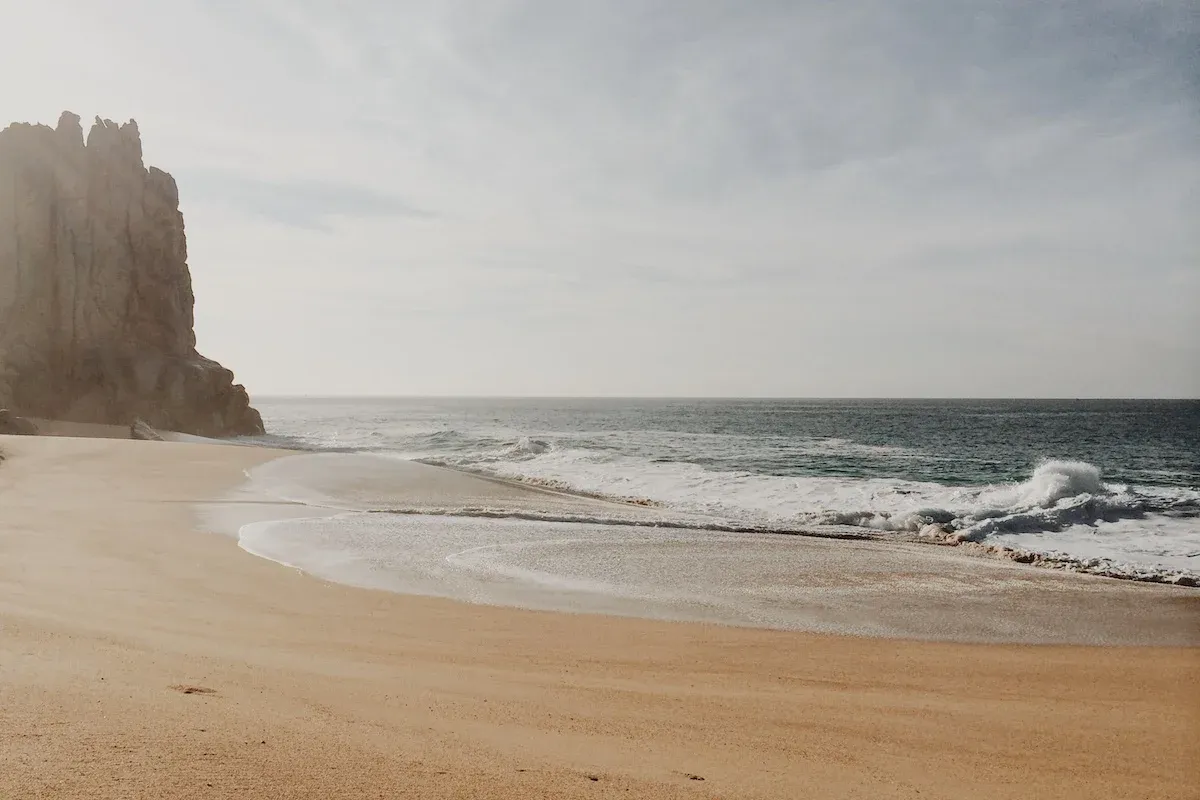 A view of a beach and the ocean