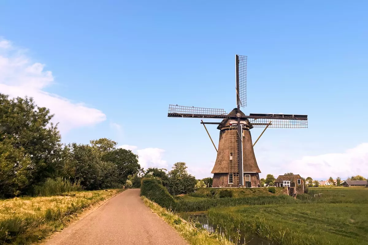 A windmill beside a country road