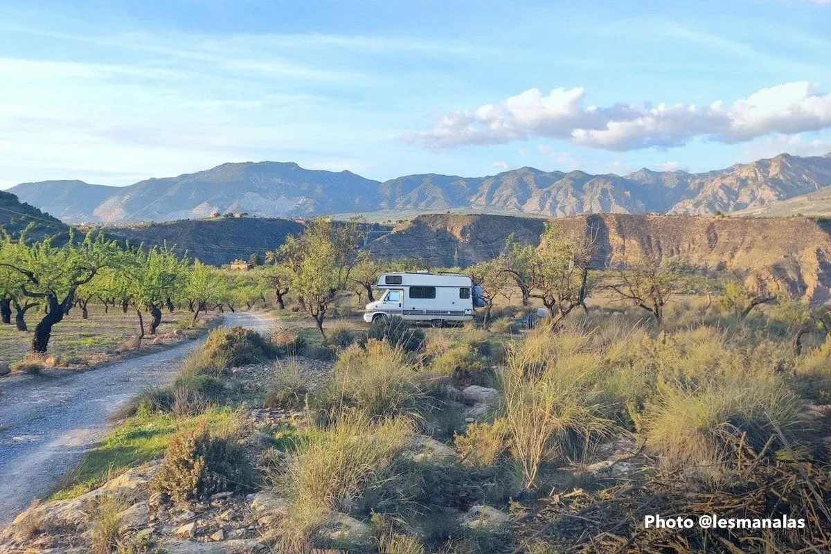 A motorhome in the middle of semi-desert country