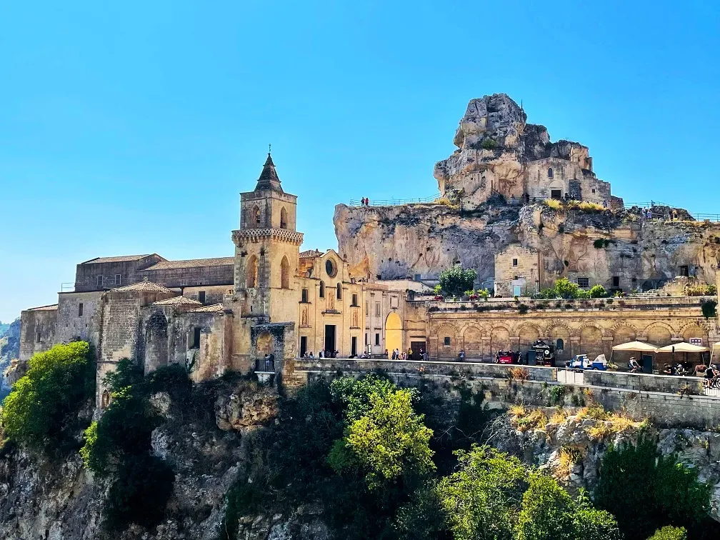 A panoramic view of a rock church in Matera and the surrounding area