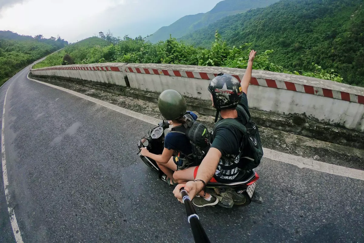 Two travelers on a motorcycle